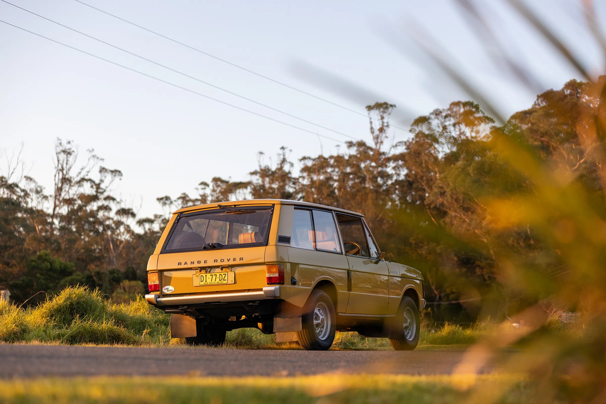 Rear end of a Restored Range Rover Classic parked up with ranges background at golden hour | Restored Range Rover Classic | Range Rover Restoration | Classic Restoration | Range Rover Build | Range Rover Coachworks