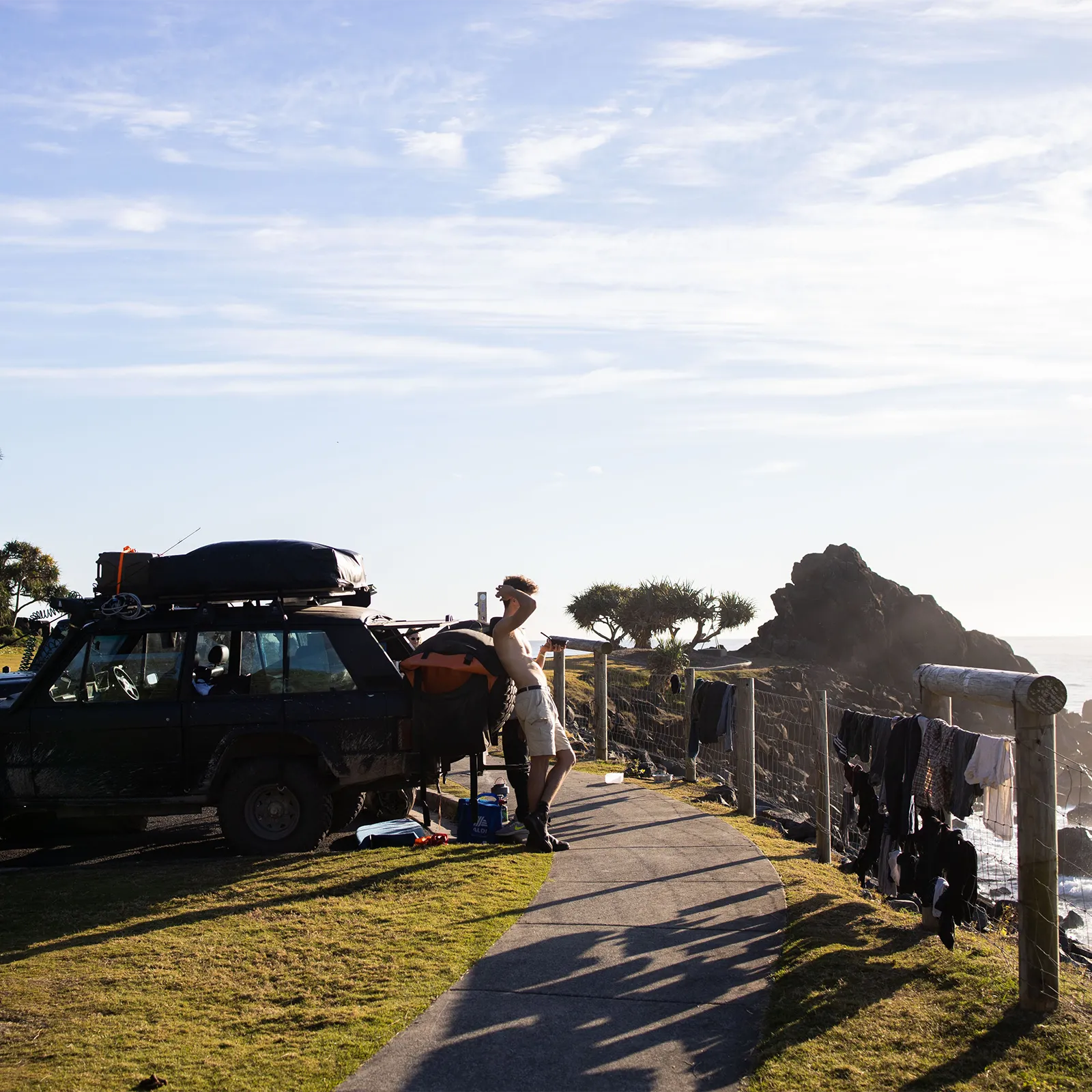 Range Rover Classic along coast with washing drying along fence | Range Rover Adventures | Range Rover Classic | Range Rover Restoration | Range Rove Build | Overlanding Range Rover Classic | Touring Range Rover Classsic
