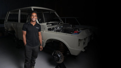 Endak Hudson stands in front of a in progress Signature Series Program by Hudson Coachworks | Range Rover Classic | Hudson Coachworks Signature Range Rover | LS Range Rover | V8 Range Rover Classic