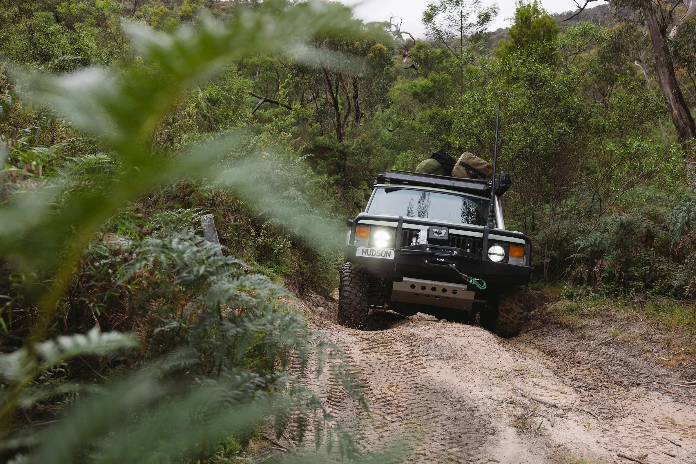 Range Rover Classic Expedition series driving up sandy 4wd track within forrest | Range Rover Adventures | Range Rover Classic | Range Rover Restoration | Range Rove Build | Overlanding Range Rover Classic | Touring Range Rover Classsic