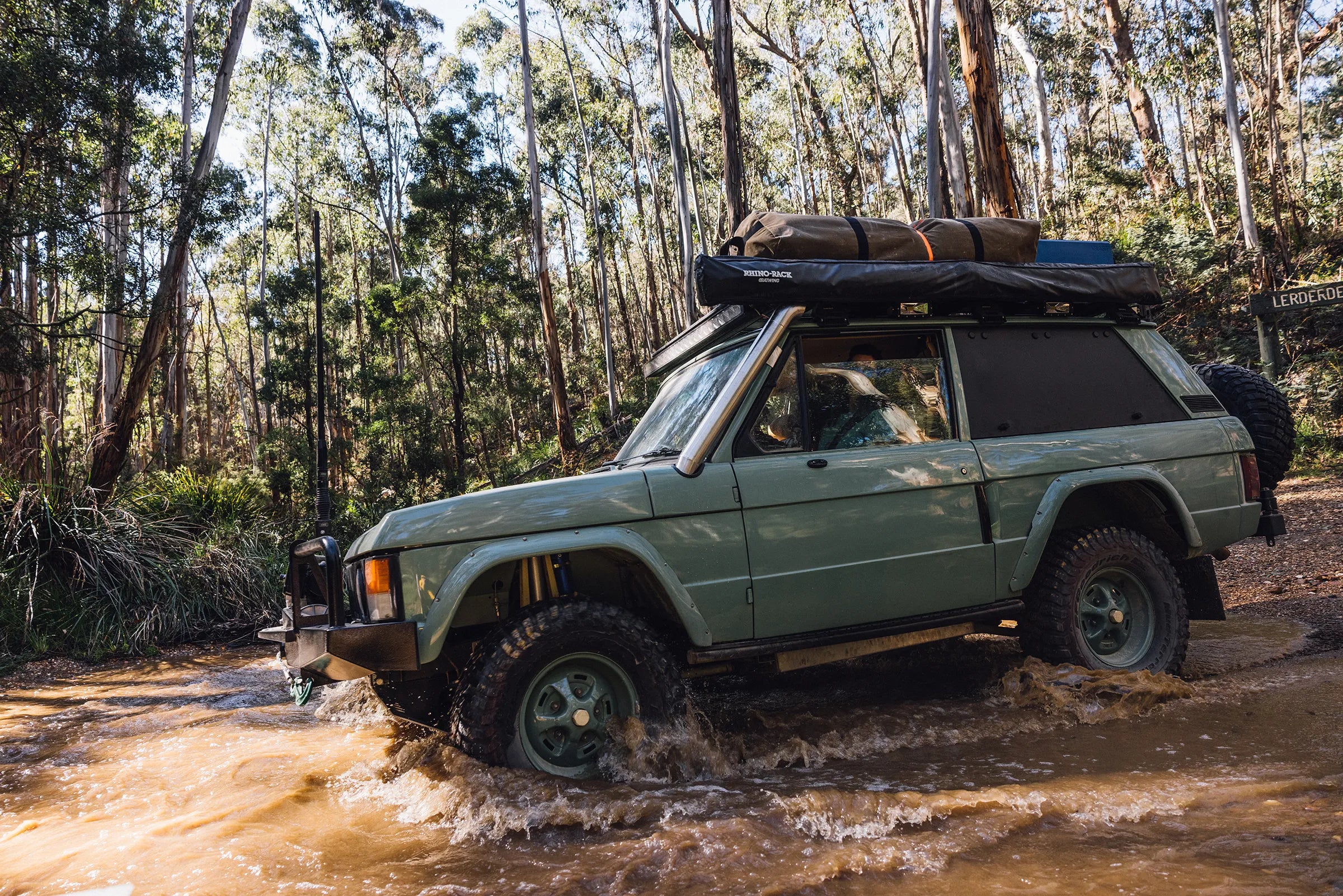 Hudson Coachworks Range Rover Classic driving through water in Australian bush | Range Rover Classic Restoration | Range Rover Remastered | Range Rover Coachworks | Expedition Series Range Rover | Overlanding Range Rover