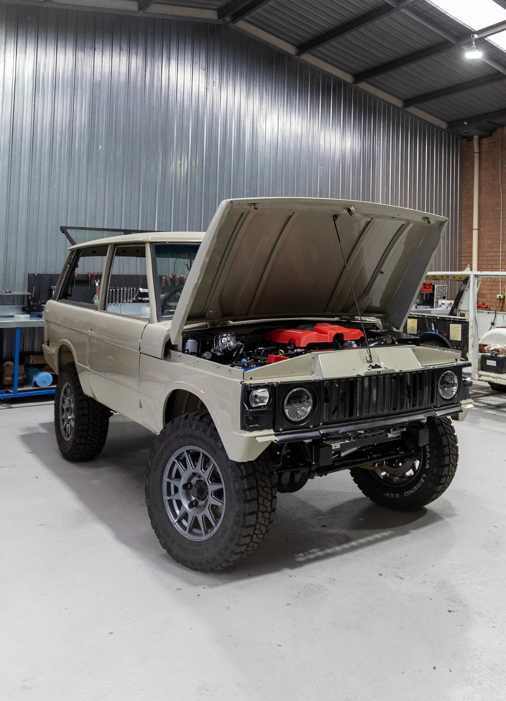 Hudson Coachworks Signature series Range Rover Classic at workshop with bonnet open showing supercharged LS engine | Range Rover Classic | Range Rover Coachworks | Range Rover Restorations | Range Rover Build | LS Range Rover | V8 Range Rover | Supercharged Range Rover