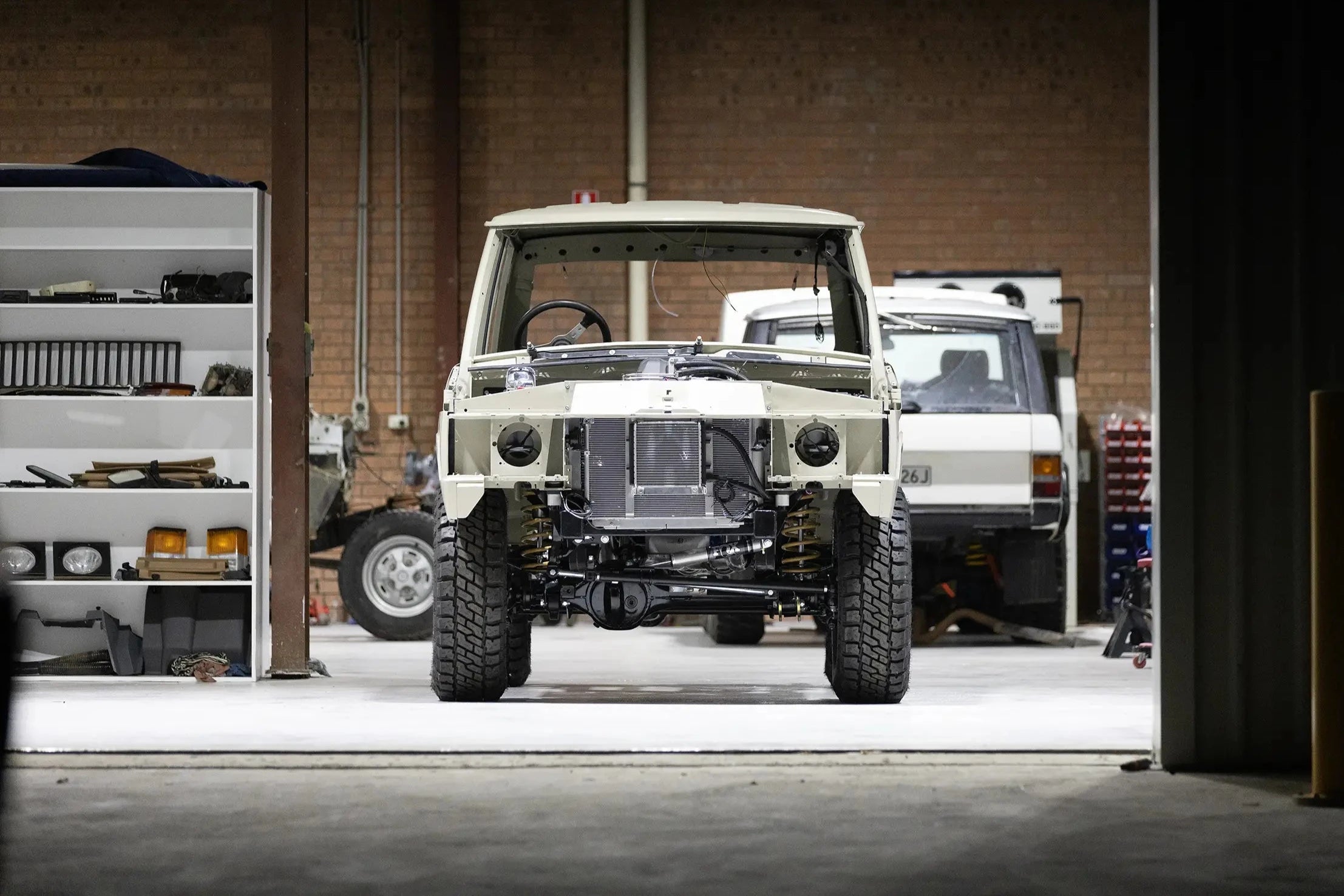 Load video: Rebuilding a Range Rover Classic | Suspension, Brakes &amp; Engine bay fit-out | Hudson Coachworks Signature Range Rover Classic Build on youtube.